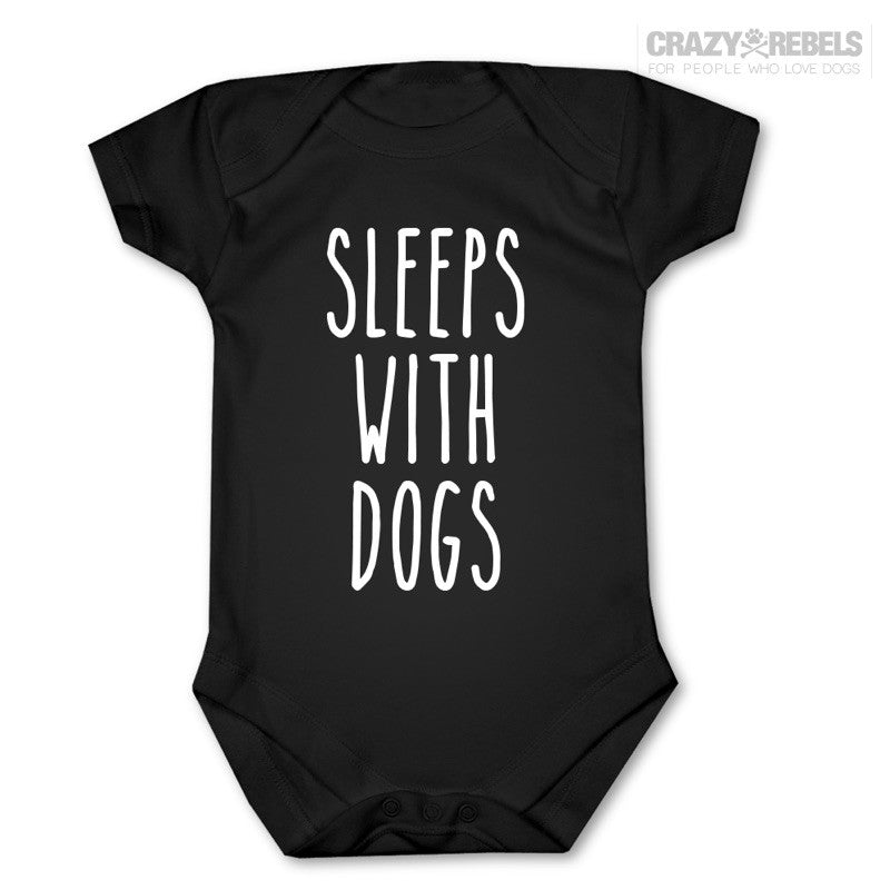 Sleeps With Dogs Baby One Piece